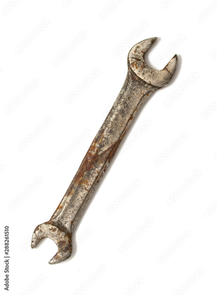 Old wrench on a white background Old wrench on a white background