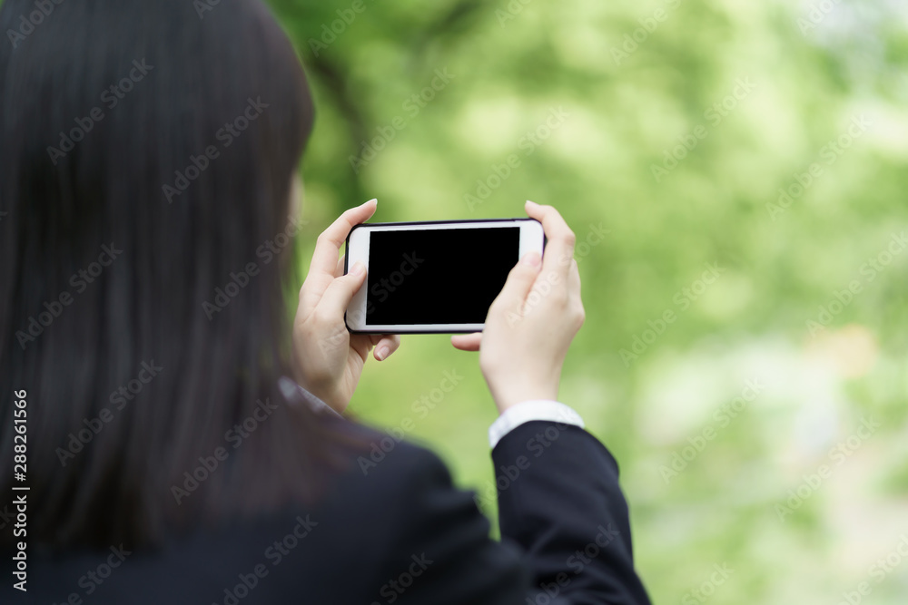 女子高生　スマートフォン