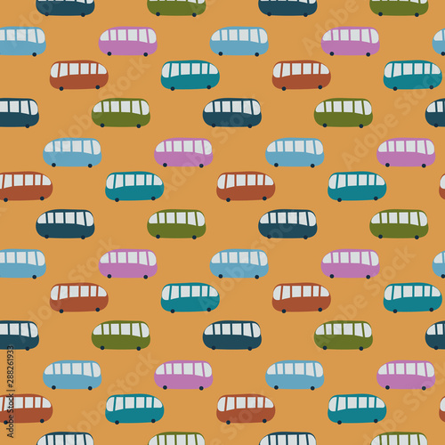 A seamless vector childish pattern with colorful cute buses on a yellow background. Surface print design.