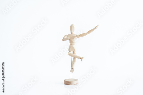 wooden dummy with a glass