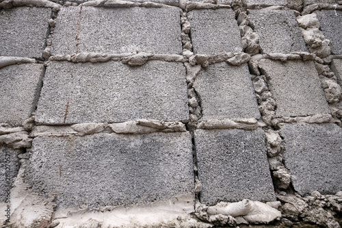 Gray brick walls that not complete while the cement already dry