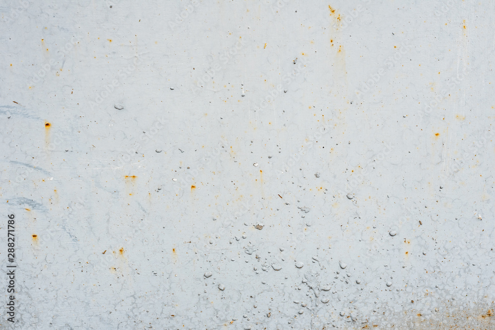 Metal texture with scratches and cracks which can be used as a background Metal texture with scratches and cracks which can be used as a background