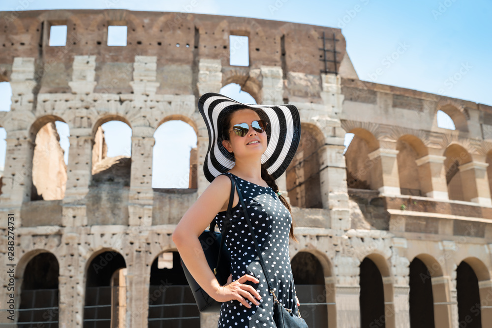Woman Standing In Front Of Colosseum
