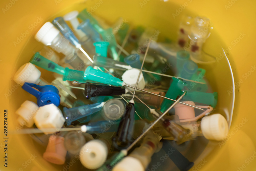 custom made wallpaper toronto digitalneedles and syringes in disinfectant. disposal of medical needles and syringes and medical waste