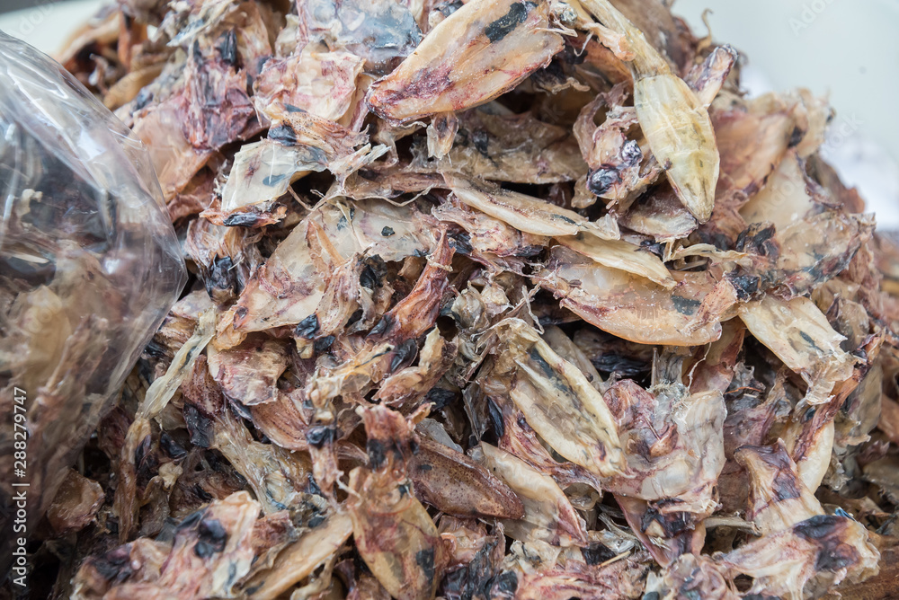 dried cuttlefish ,dried squid in Thailand market ,seafood background ,seafood market, traditional raw food