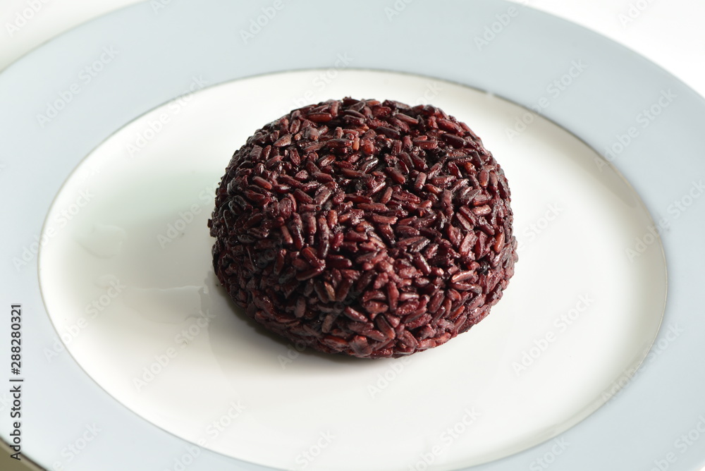 Cooked rice berry in plate on white background Cooked rice berry in plate on white background