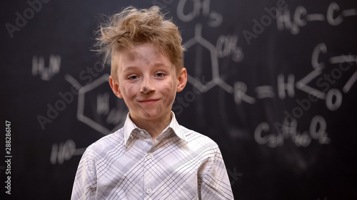 Photography Little hooligan making explosion on chemistry lesson, naughty boy in school