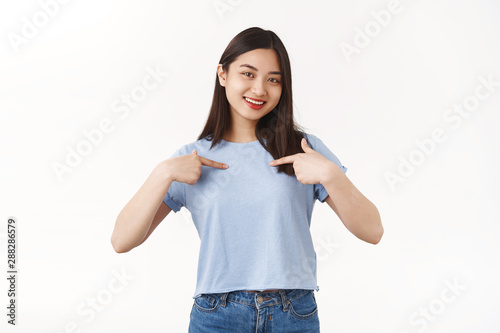 Me best candidate. Self-assured pretty asian brunette girl volunteering pointing herself boastful smiling delighted telling herself bragging own achievements wanna be picked chosen