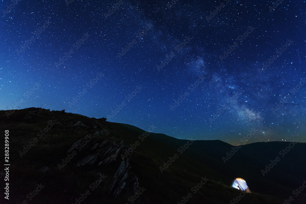 Night photos in the Ukrainian Carpathian Mountains with a bright starry sky and the Milky Way