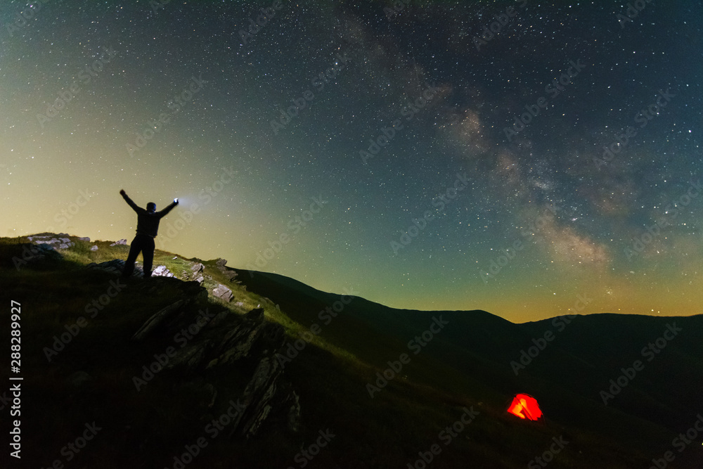 Fototapeta premium Night photos in the Ukrainian Carpathian Mountains with a bright starry sky and the Milky Way