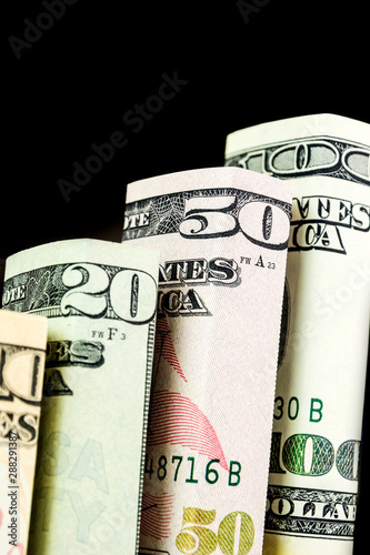 rising steps made of blocks of all american dollar denominations banknotes