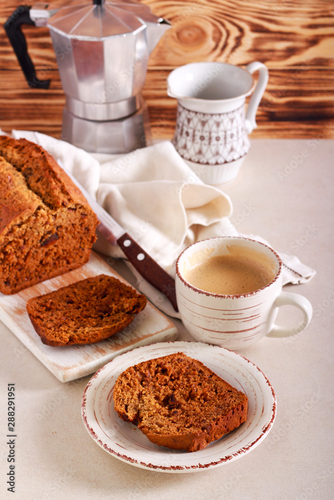 Date loaf, served with coffee Date loaf, served with coffee