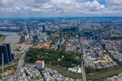 Landscape Ho Chi Minh city take by drone on the sunset with building , downtown street and public transport - at Viet Nam