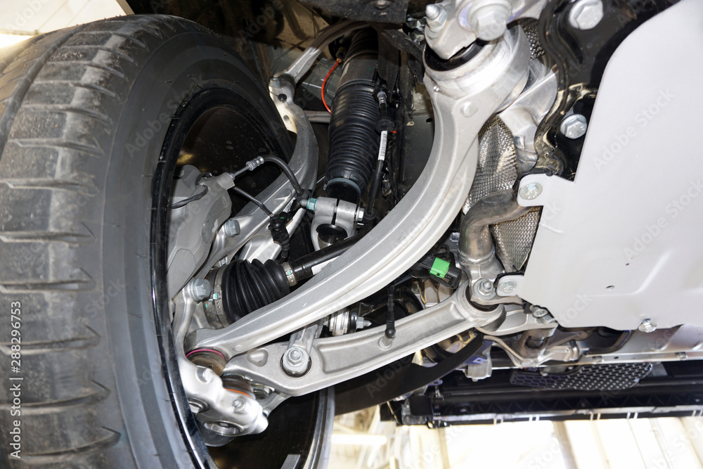 The structure of the modern car. Elements of front suspension. Control arm. Tie rod. Drive unit. Wheel bearing housing. Shock absorber. The structure of the modern car. Elements of front suspension. Control arm. Tie rod. Drive unit. Wheel bearing housing. Shock absorber.