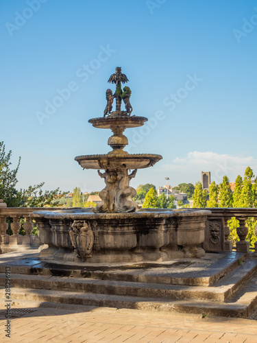 fountain on the terrace near Priory palace in the old town of Viterbo, Italy