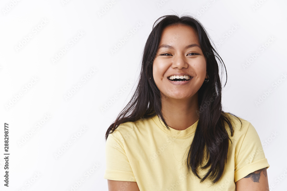 Lifestyle, body positive and people concept. Portrait of happy attractive carefree young malaysian girl with tattoo and facial flaws smiling, laughing from joy and happiness expressing positivity Lifestyle, body positive and people concept. Portrait of happy attractive carefree young malaysian girl with tattoo and facial flaws smiling, laughing from joy and happiness expressing positivity