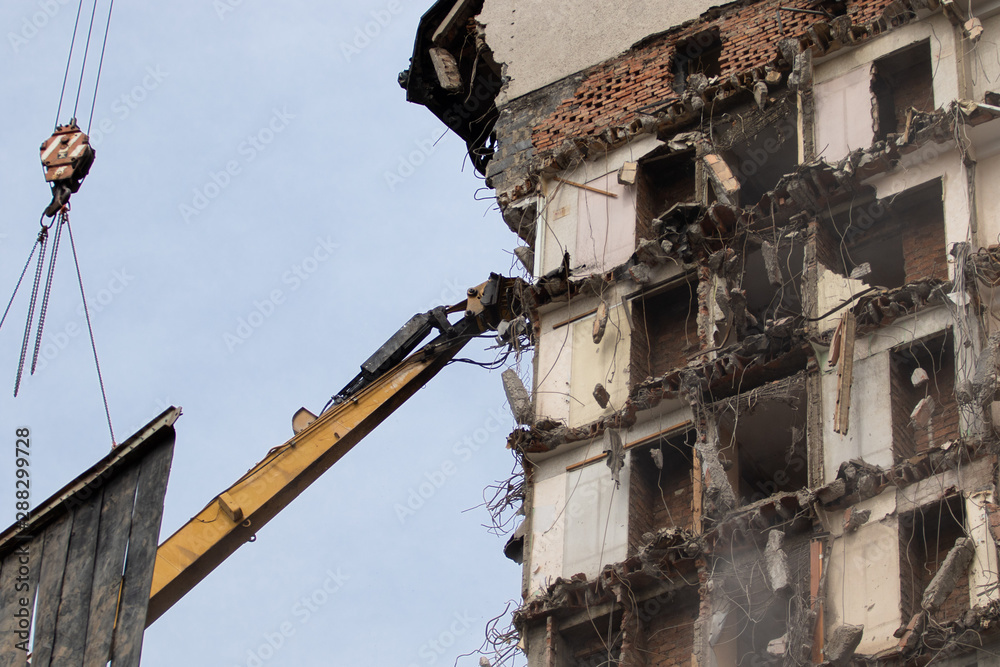 Destruction of an old multi-story apartment building