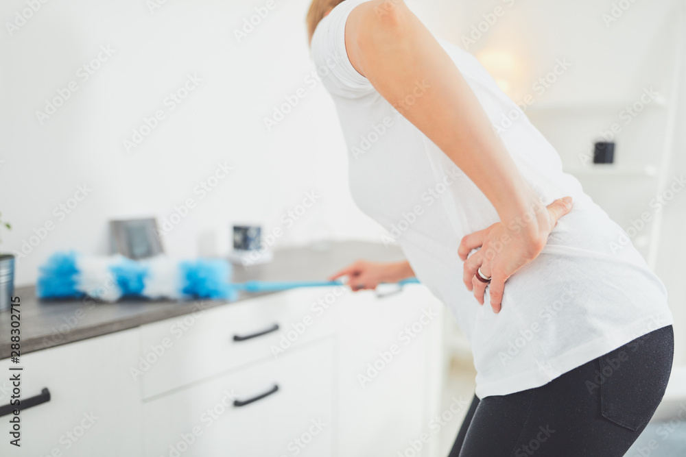 Fototapeta premium Injury while cleaning the house and doing daily housework.