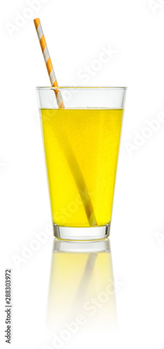 An orange soft drink with a straw