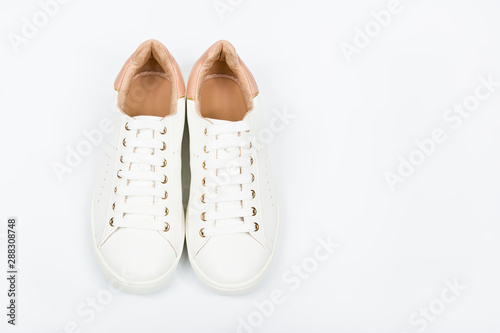 Women's sport leather shoes on white background
