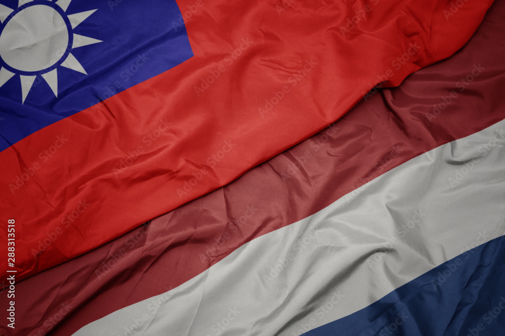 waving colorful flag of netherlands and national flag of taiwan. waving colorful flag of netherlands and national flag of taiwan.