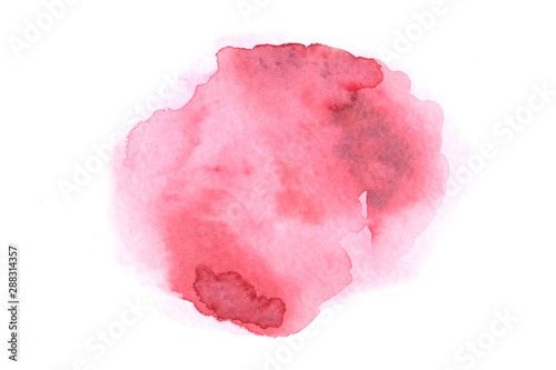 Abstract hand drawn pink watercolor stain on a white background