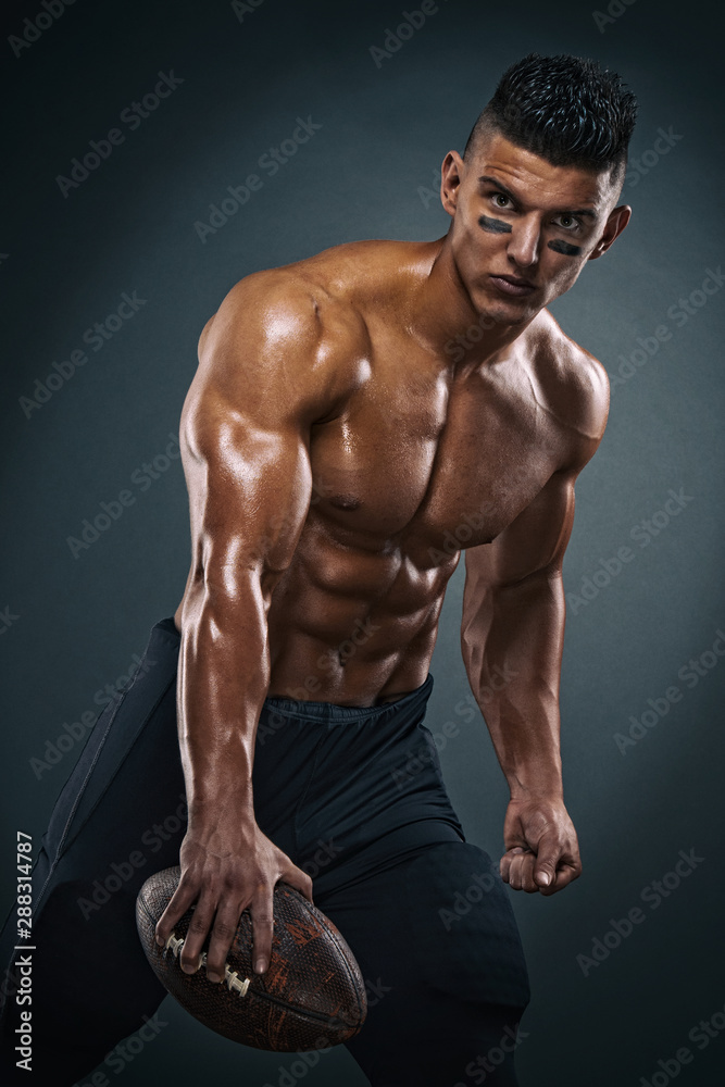 Fototapeta premium Strong, Shirtless American Football Player