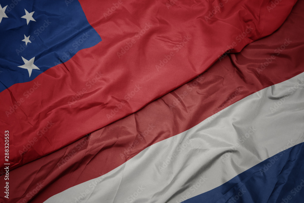 waving colorful flag of netherlands and national flag of Samoa . waving colorful flag of netherlands and national flag of Samoa .