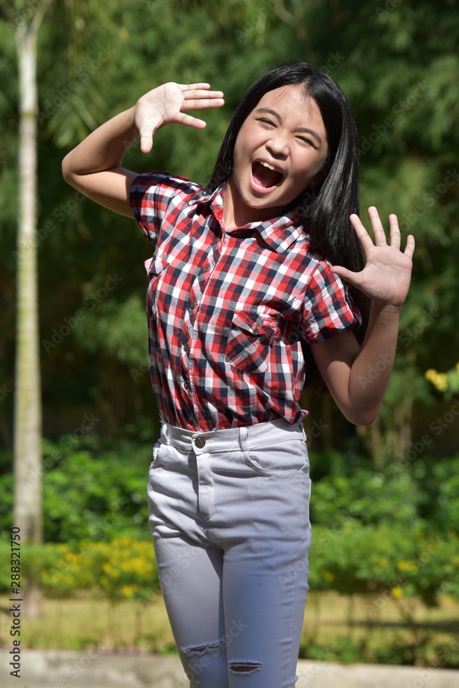 A Petite Diverse Tween Laughing A Petite Diverse Tween Laughing
