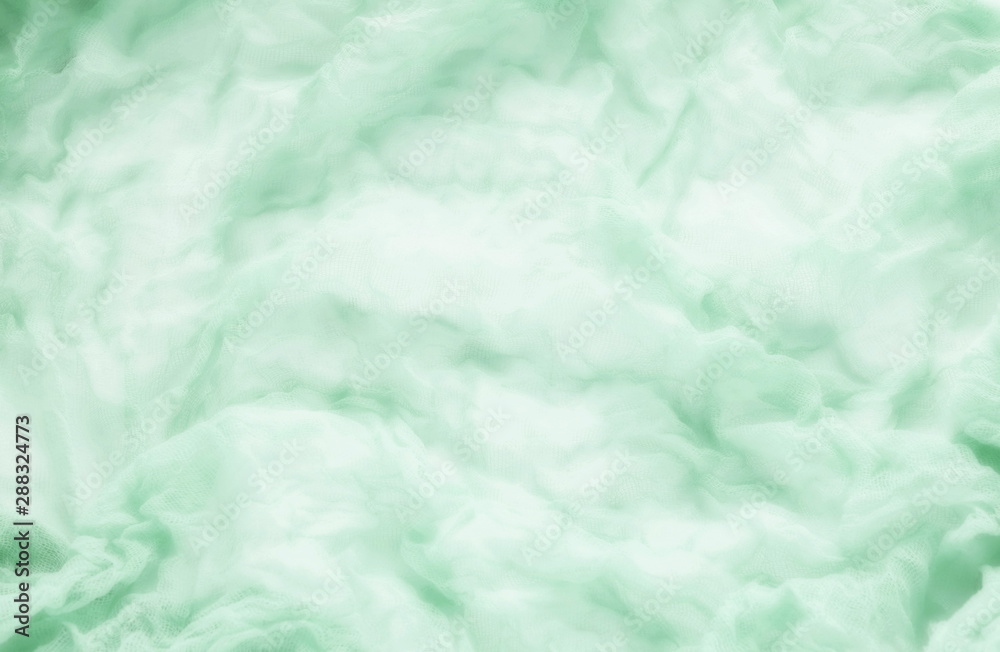 Fototapeta premium cotton fabric texture, background pastel neo mint color blured. copy space