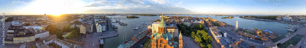 Panoramic sunset aerial view of Helsinki skyline from city port in summer season