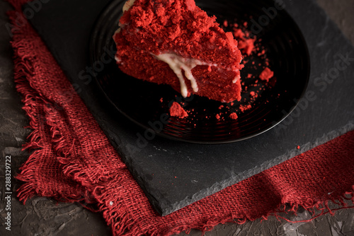 Red velvet cake Canvas napkin on a concrete dark gray background