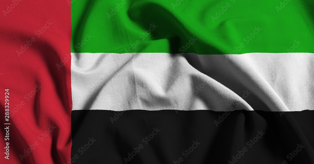 Obraz premium National flag of UAE on a waving cotton texture background
