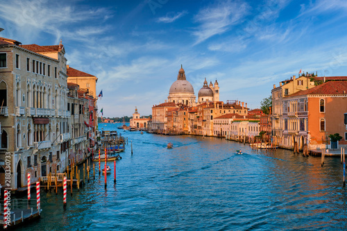 View of Venice Grand Canal and Santa Maria della Salute church on sunset © Dmitry Rukhlenko
