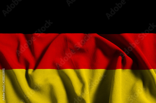 National flag of Germany on a waving cotton texture background