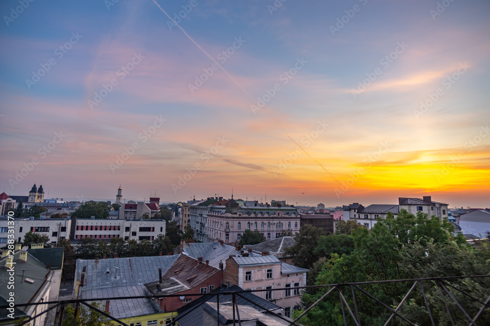 Sunrise over the city rooftops