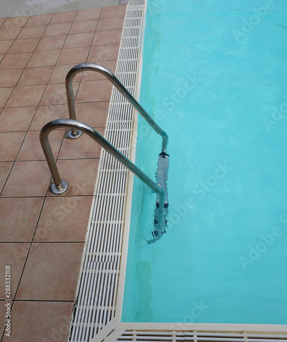 swimming pool and a stepladder