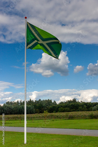 Flag of the dutch region Achterhoek blowing in the wind