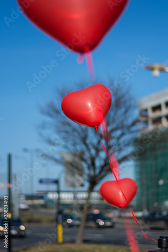 red balloons in the sky