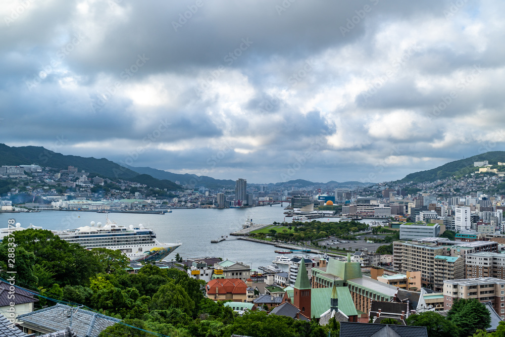 Timelapse of clouds move across Nagasaki's sky over the harbour