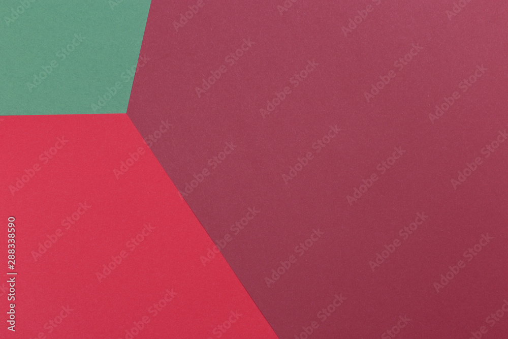 Obraz premium Paper green, burgundy, red empty background, geometrically located. Color blank for presentations, copy space.