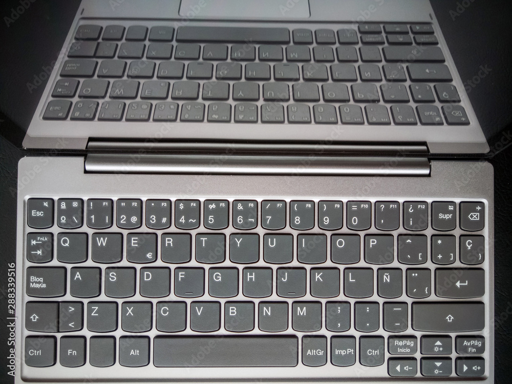 Laptop with keyboard in Spanish