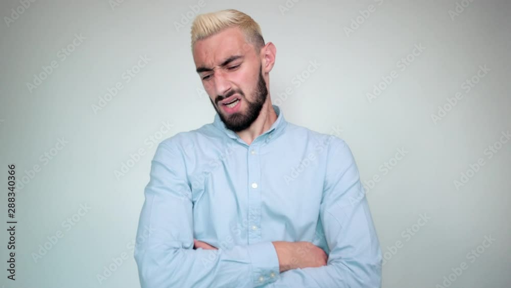 man with blond hair, black beard over isolated white background shows emotions man with blond hair, black beard over isolated white background shows emotions