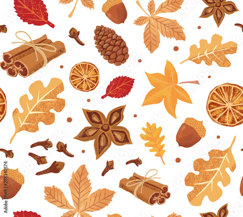 Autumn Seamless Vector Pattern with Pumpkin spice elements: cinnamon, cloves, anise and yellow and red leaves, cones and acorns on the white background. 