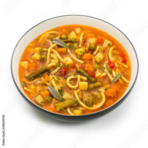 Vegetarian Vegetable Soup Isolated on a white background. Selective focus.