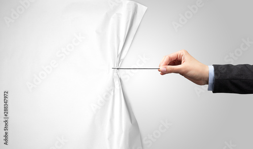 Tableau sur toile hand pulling white paper curtain, changing scene concept