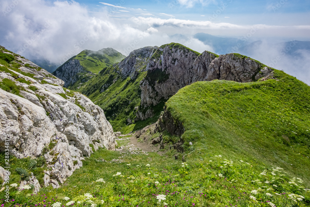 The top of the Črna prst mountain in the lower Bohinj mountains in Julian Alps, Slovenia The top of the Črna prst mountain in the lower Bohinj mountains in Julian Alps, Slovenia