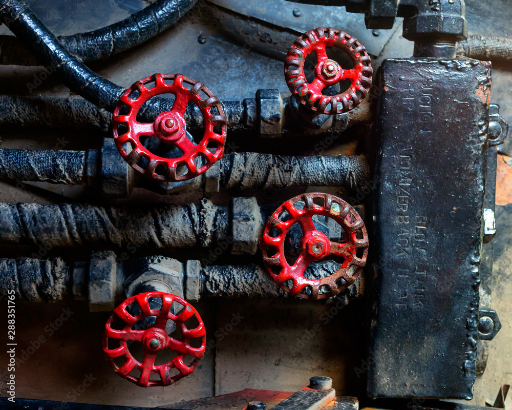 Fototapeta premium steampunk red control knobs mechanical background