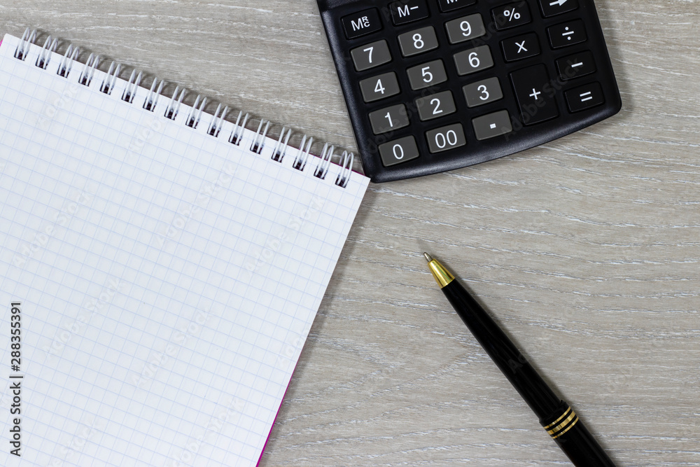 Notepad, pen, calculator. Notepad, pen, calculator.