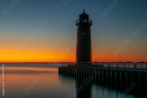 Lighthouse at sunrise on Lake Michigan in Milwaukee, WI © AMC-Imagery, LLC